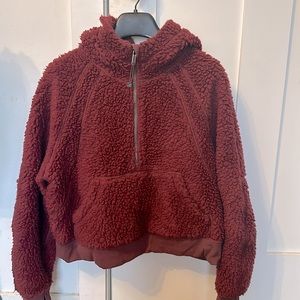 Lululemon fuzzy hoodie (wine) in color